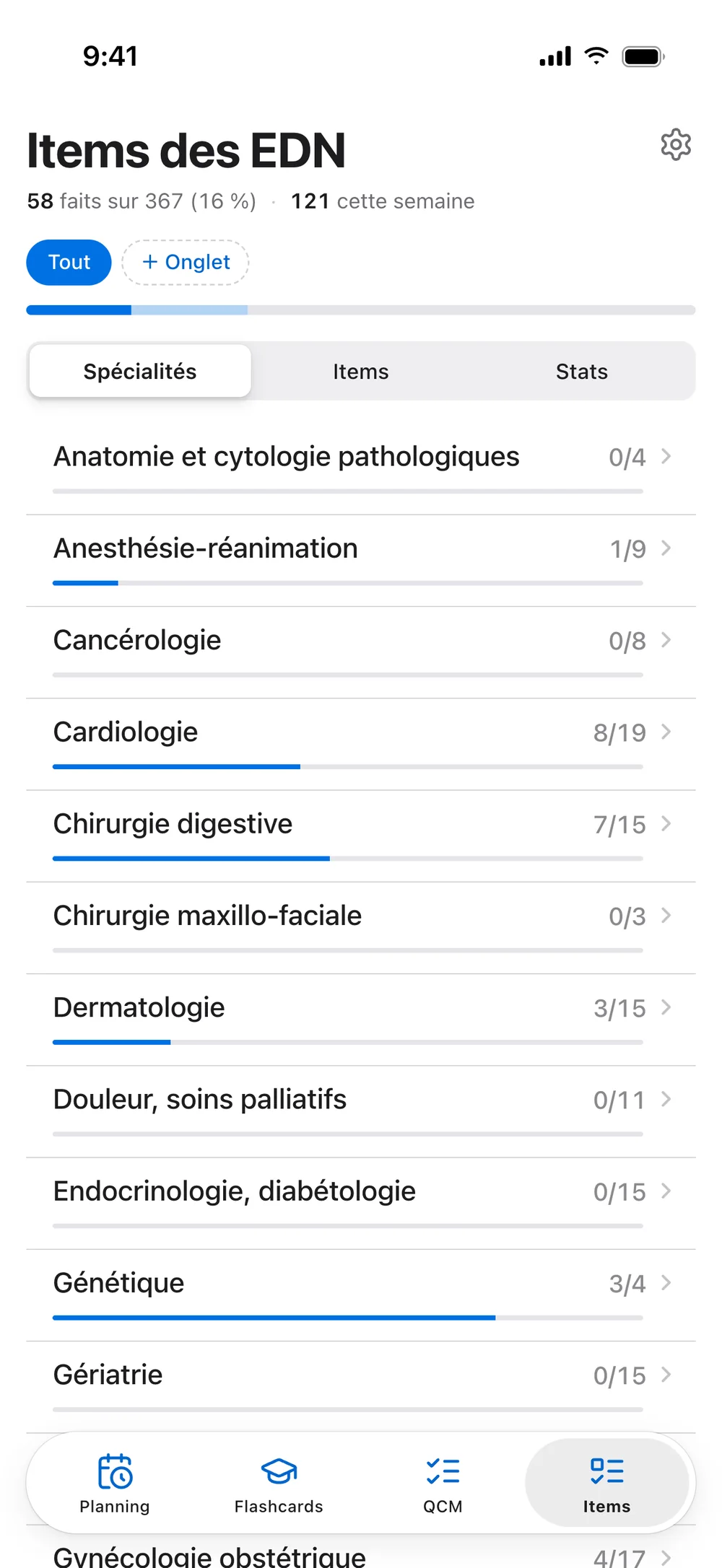 L'onglet Items sur l'iPhone : les spécialités en liste, chacune avec sa progression.